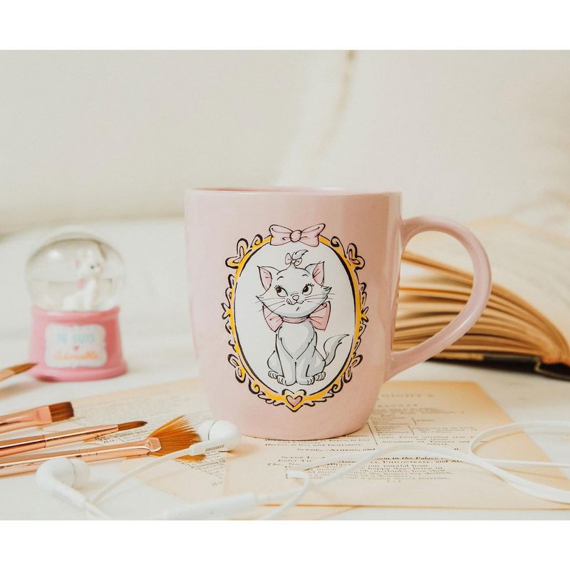 http://www.aurainpink.com/cdn/shop/products/SilverBuffaloDisneyTheAristocatsMarieCatInGoldOvalMirrorFramePurrrrrfectPinkCeramicCoffeeMug7_1200x1200.jpg?v=1668818986